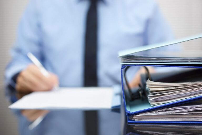 assessor looking over property owner's evidence for why a property valuation is too high